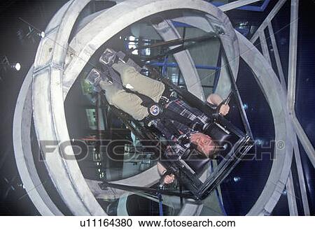 Child in anti-gravity exercise machine at Space Camp View Large Photo Image Stock Image - Child in anti-gravity exercise machine at Space Camp. Fotosearch