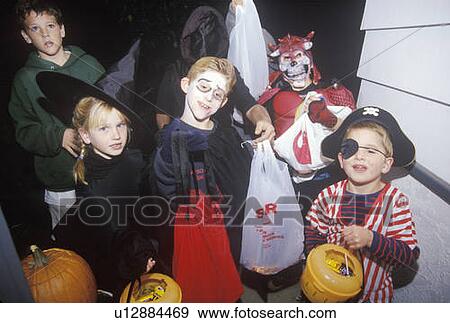 Children Dressed in Halloween Costumes View Large Photo Image Stock Photo - Children Dressed in Halloween Costumes. Fotosearch