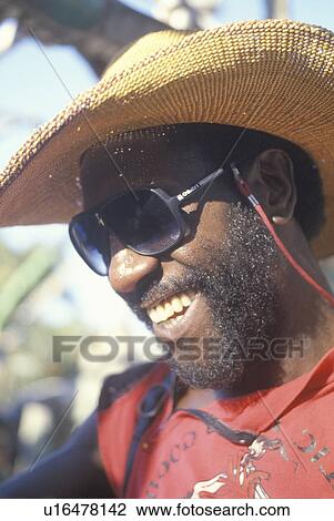 Stock Image - Close-up of a smiling African-American man. Fotosearch