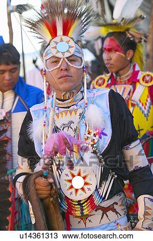 Close-up portrait of Native American in full regalia dancing at Pow wow View Large Photo Image Stock Image - Close-up portrait of Native American in full regalia dancing at Pow wow. Fotosearch