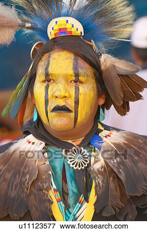 Close-up portrait of Native American in full regalia dancing at Pow wow View Large Photo Image Stock Photo - Close-up portrait of Native American in full regalia dancing at Pow wow. Fotosearch