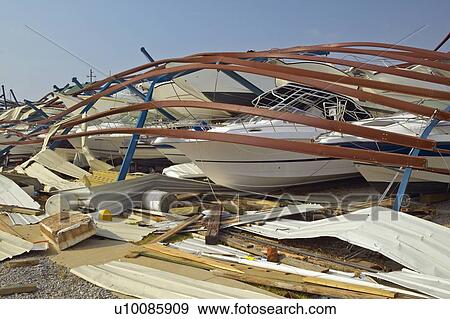 Stock Photo - Collapsed boat storage facility from Hurricane Ivan storm in Pensacola Florida. Fotosearch