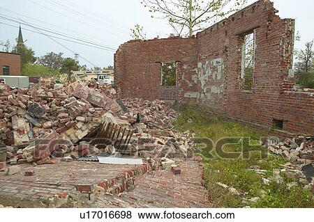 Collapsed brick wall from building hit hard by Hurricane Ivan in Pensacola Florida View Large Photo Image Stock Photo - Collapsed brick wall from building hit hard by Hurricane Ivan in Pensacola Florida. Fotosearch