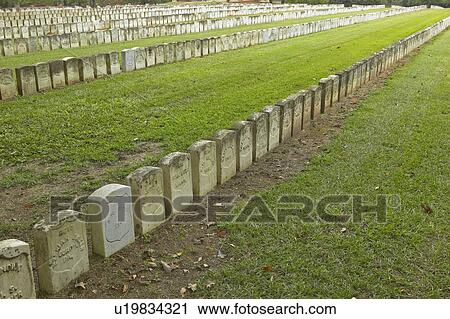 Stock Image - Confederate Civil War prison and cemetery tombstones. Fotosearch