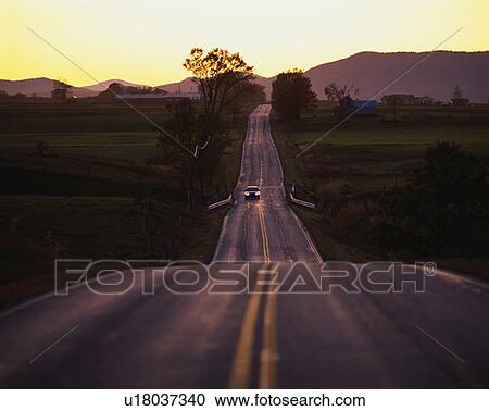 Country Road at Sunset View Large Photo Image Stock Image - Country Road at Sunset. Fotosearch