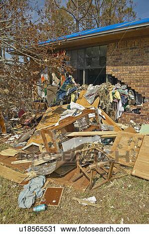 Debris in front of house heavily hit by Hurricane Ivan in Pensacola Florida View Large Photo Image Stock Image - Debris in front of house heavily hit by Hurricane Ivan in Pensacola Florida. Fotosearch
