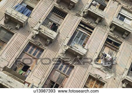 Dilapidated building and apartment windows in Old Havana, Cuba View Large Photo Image Stock Image - Dilapidated building and apartment windows in Old Havana, Cuba. Fotosearch