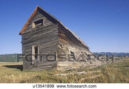 Dilapidated wooden farmhouse View Large Photo Image Stock Photo - Dilapidated wooden farmhouse. Fotosearch