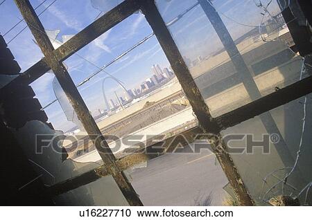 Stock Image - Downtown St. Louis through broken glass. Fotosearch