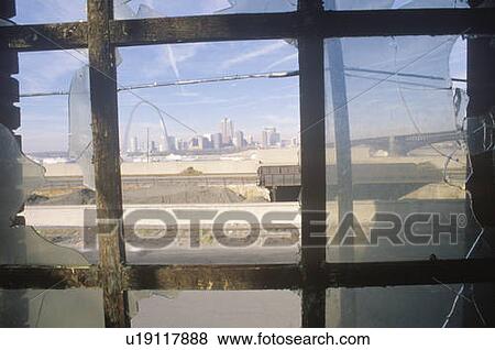 Stock Photo - Downtown St. Louis through broken glass. Fotosearch