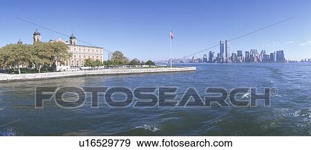 Stock Photo - Ellis Island, Manhattan Skyline, New York. Fotosearch