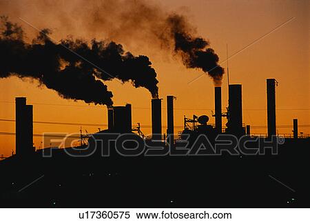 Stock Photography - Factory at sunset. Fotosearch
