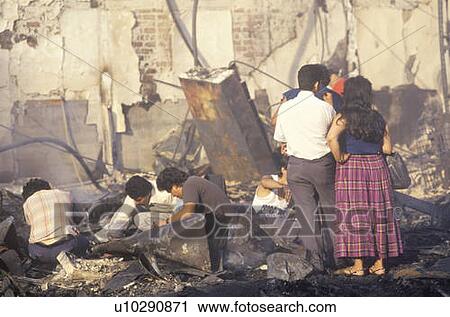 Family rummaging through home burned during riots, South Central Los Angeles, California View Large Photo Image Stock Image - Family rummaging through home burned during riots, South Central Los Angeles, California. Fotosearch