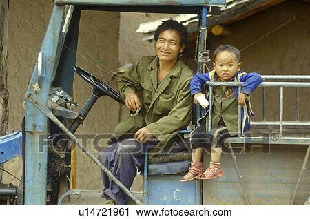 Father and son in old truck near Dali, Yunnan Province, People's Republic of China View Large Photo Image Stock Image - Father and son in old truck near Dali, Yunnan Province, People's Republic of China. Fotosearch