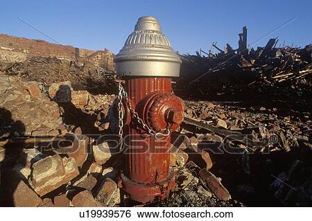 Stock Photograph - Fire hydrant at burned out building site. Fotosearch