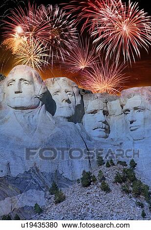 Stock Image - Fireworks behind Mount Rushmore. Fotosearch
