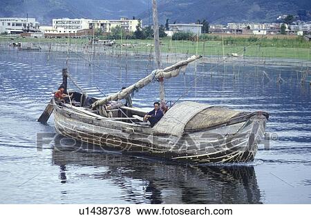 Stock Photo - Fishermen on Erhai Lake. Fotosearch