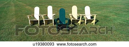 Five wooden lawn chairs against a green lawn background View Large Photo Image Stock Image - Five wooden lawn chairs against a green lawn background. Fotosearch