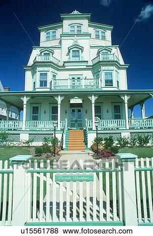 Four-story Victorian house and picket fence View Large Photo Image Stock Photo - Four-story Victorian house and picket fence. Fotosearch