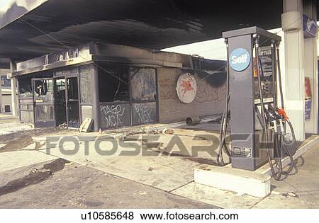 Stock Photo - Gas station burned out during 1992 riots, South Central Los Angeles, California. Fotosearch