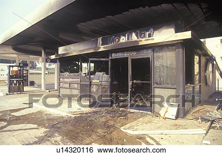 Stock Photograph - Gas station burned out during 1992 riots, South Central Los Angeles, California. Fotosearch