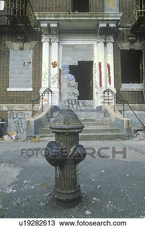Stock Image - Ghetto neighborhood corner. Fotosearch