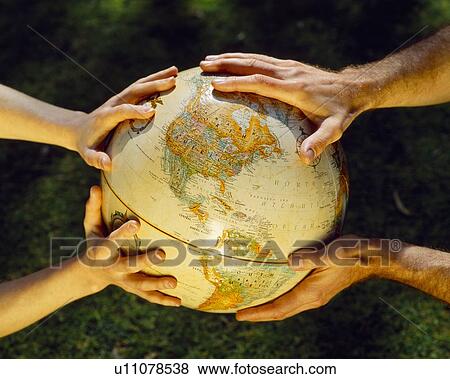 Stock Photo - Globe in hands, environmental care. Fotosearch