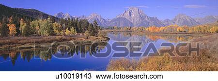 Stock Image - Grand Tetons reflected in Oxbow Bend, Wyoming. Fotosearch