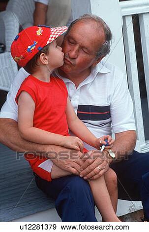 Stock Photo - Grandfather and grandson on porch. Fotosearch