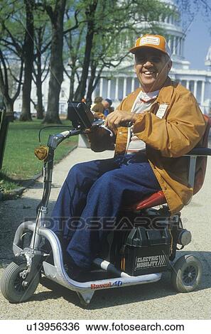 Handicapped man smiling at camera View Large Photo Image Stock Photograph - Handicapped man smiling at camera. Fotosearch