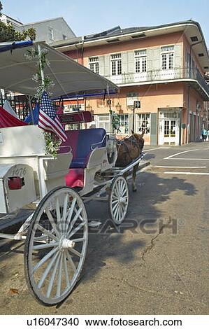 Stock Image - Horse Carriage in French Quarter of New Orleans, Louisiana. Fotosearch