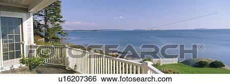 Stock Photograph - House with a view of Spruce Head Harbor, Maine. Fotosearch