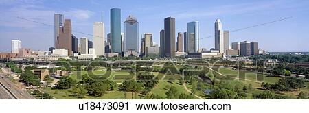 Stock Image - Houston Skyline, Memorial Park, Texas. Fotosearch