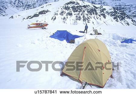 Stock Image - Ice camping on glacier. Fotosearch