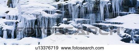 Icicles and snowy rocks in Sierra Nevada Mountains, California View Large Photo Image Stock Photo - Icicles and snowy rocks in Sierra Nevada Mountains, California. Fotosearch