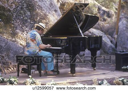 Jazz pianist, Roger Kellaway, performing at an outdoor festival, Ojai, CA View Large Photo Image Stock Photo - Jazz pianist, Roger Kellaway, performing at an outdoor festival, Ojai, CA. Fotosearch
