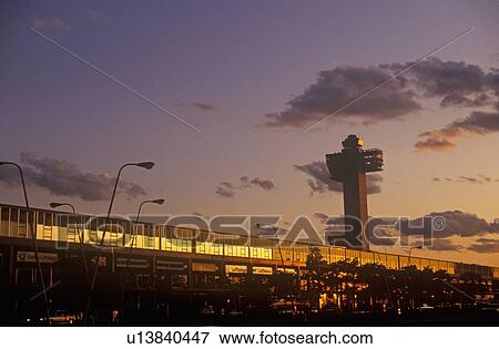John F. Kennedy Airport at sunset, New York City, NY View Large Photo Image Stock Photo - John F. Kennedy Airport at sunset, New York City, NY. Fotosearch