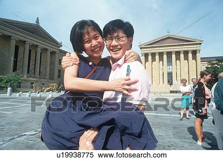 Stock Photography - Korean-American newlyweds at the Philadelphia Museum of Art, Pennsylvania. Fotosearch