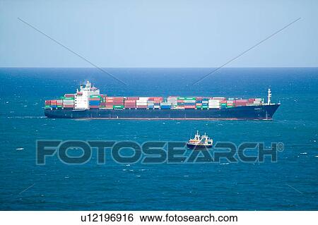 Stock Photograph - Large cargo ship bringing cargo. Fotosearch
