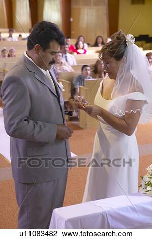 Latino-American exchange wedding rings View Large Photo Image Stock Image - Latino-American exchange wedding rings. Fotosearch
