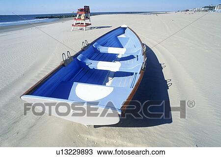 Stock Image - Lifeboat on Beach in the morning, Cape May, NJ. Fotosearch