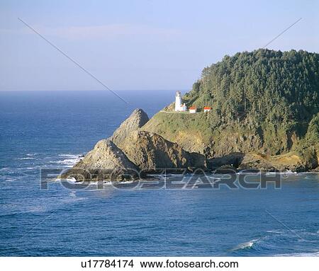 Picture - Lighthouse along coastline. Fotosearch