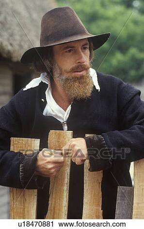 Stock Image - Living history reenactment of Pilgrims on Plymouth Plantation. Fotosearch