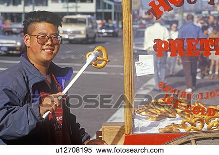 Stock Photography - Man sells pretzels in Fisherman's Wharf, San Francisco, California. Fotosearch
