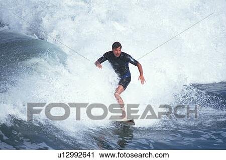 Man surfing View Large Photo Image Stock Image - Man surfing. Fotosearch