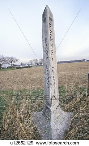 Stock Photo - Marker at the Mason Dixon line. Fotosearch