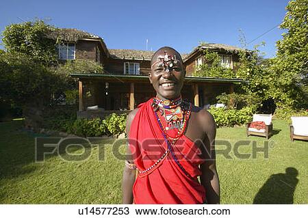 Masai Warrior in red robe View Large Photo Image Stock Image - Masai Warrior in red robe. Fotosearch