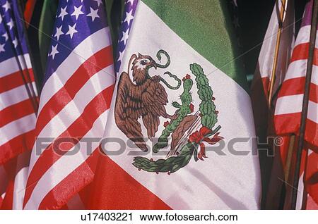Stock Image - Mexican and American Flags, May 5th, Olvera Street, Los Angeles, California. Fotosearch