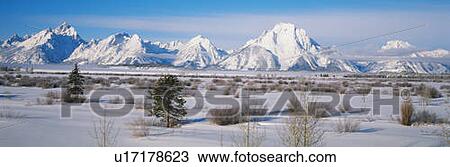 Stock Image - Mountain Peaks in Winter. Fotosearch