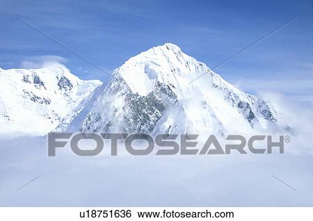 Stock Photograph - Mountain tops in St. Elias National Park and Preserve. Fotosearch
